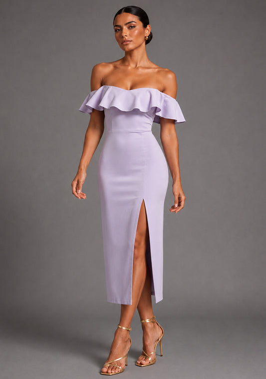 Front image of a model wearing the VSPR Deirdre Bardot Off-Shoulder Frill Lilac Midaxi Dress with an off-shoulder Bardot neckline, layered frill detailing, front skirt split, and elegant midaxi silhouette, standing against a grey studio backdrop.