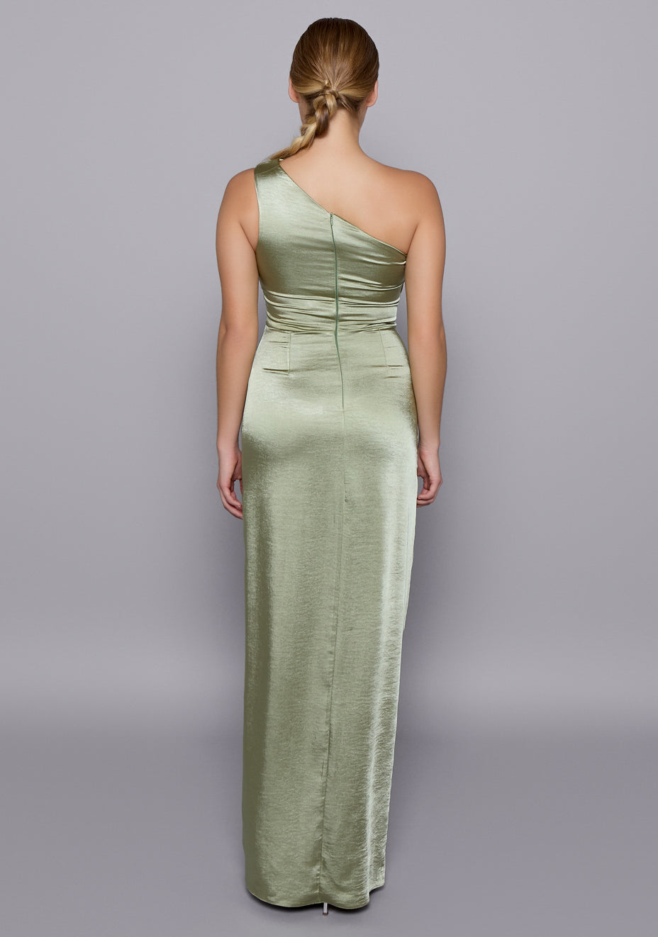 Back view of the VSPR Fliss satin dress showing the invisible zipper and gentle tailoring, with the satin catching light to reveal elegant craftsmanship.