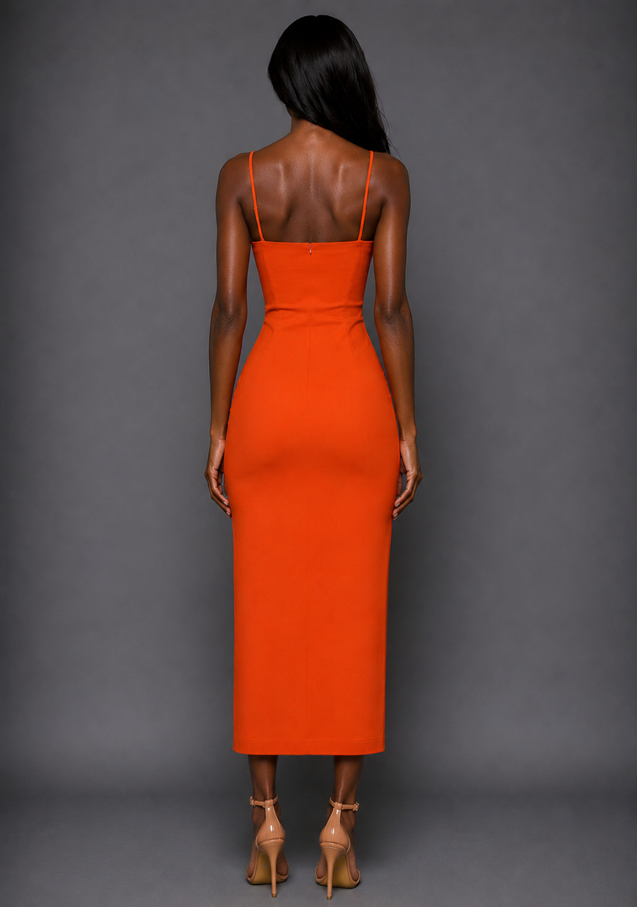 Back image of a model wearing the VSPR Tate Cami Strap Orange Midaxi Dress displaying the clean back design, fitted silhouette and sophisticated midaxi profile.